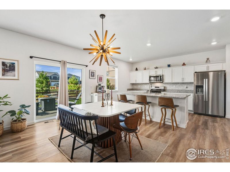 Dining Area to Kitchen and Backyard Deck