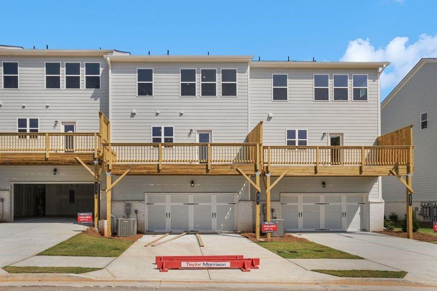Front exterior of a new home in Somerset at Veterans Memorial, Mableton, GA, highlighting curb appeal (Image 22).