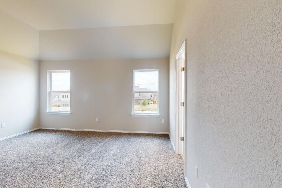 Spacious, unfurnished interior of a new home in Cascades at Onion Creek, Austin (Image 15).