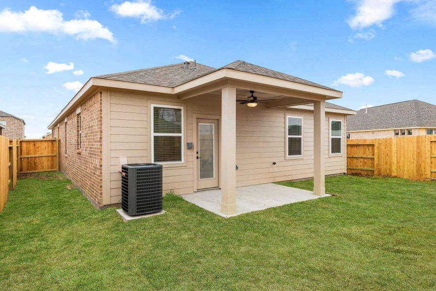 Exterior details and patio area of a home in Emberly, Beasley (Image 2).