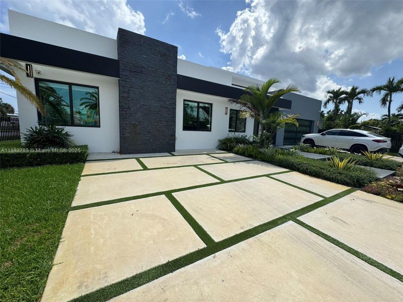 Front exterior of a new home in , Miami, FL, highlighting curb appeal (Image 22).