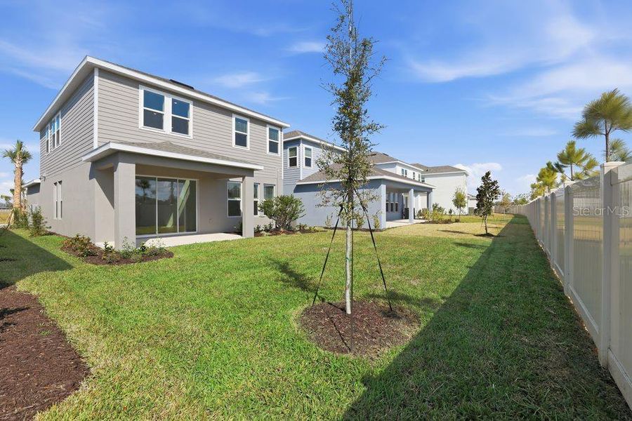 Exterior details and patio area of a home in Indigo Creek, Apollo Beach (Image 3).