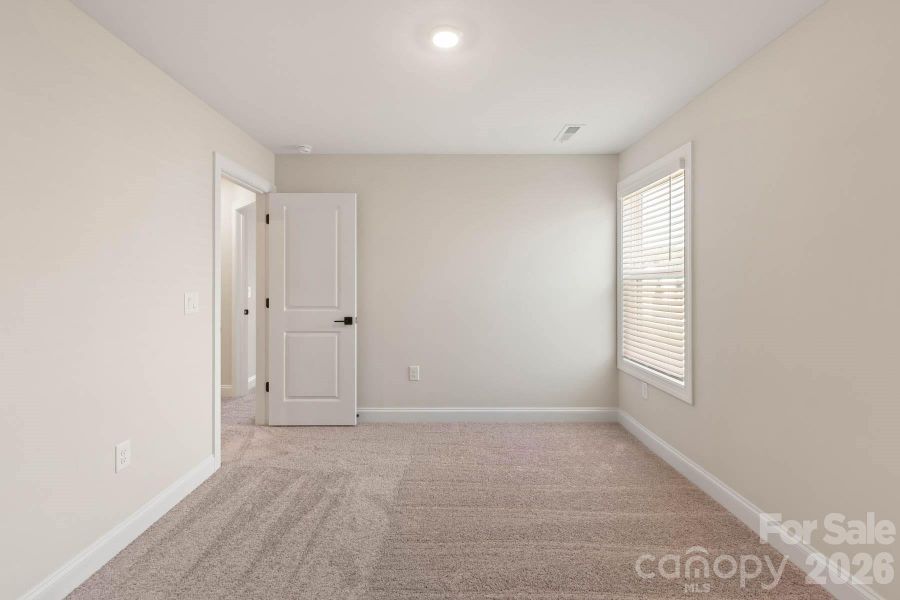 Spacious, unfurnished interior of a new home in Colonial Crossing, Troutman (Image 13).