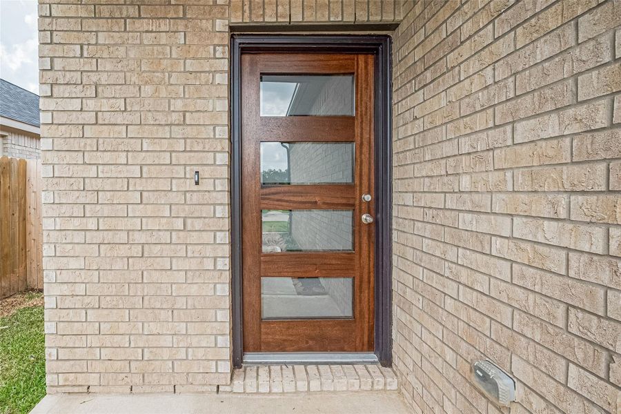 Exterior details and patio area of a home in Woodland Lakes, Huffman (Image 3). Exterior details and patio area of a home in Woodland Lakes, Huffman (Image 3).