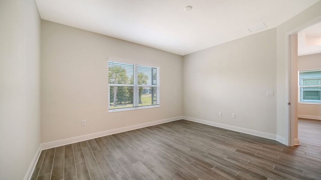 Spacious, unfurnished interior of a new home in Windward Real Estate and Homes for Sale in Sarasota, FL - Neal Communities, Lakewood Ranch (Image 25).