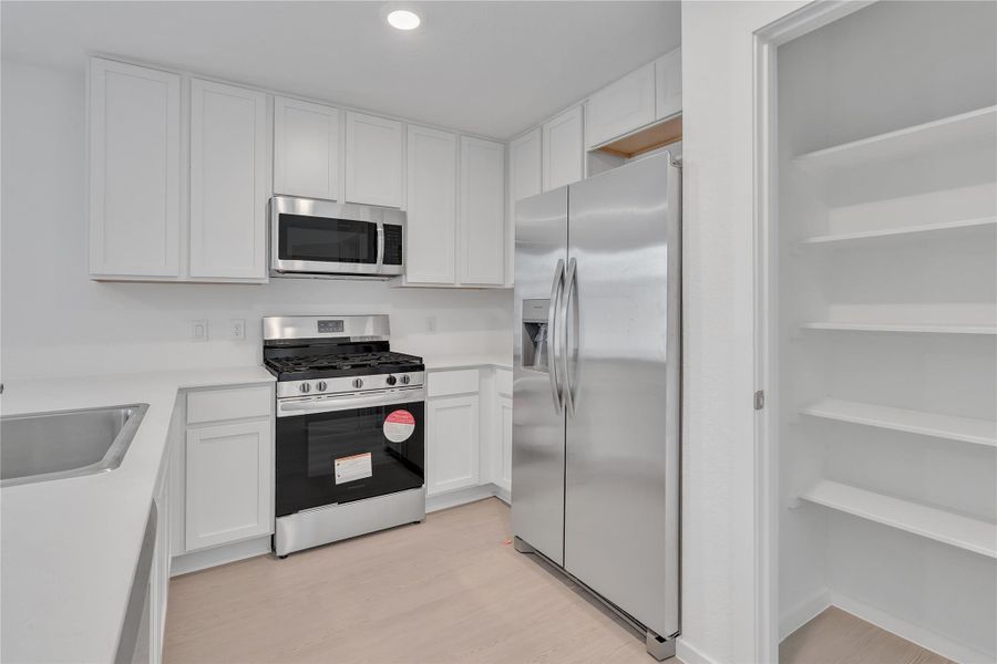 Furnished interior view inside a new home in Tavola: Cottage Collection, New Caney (Image 6).