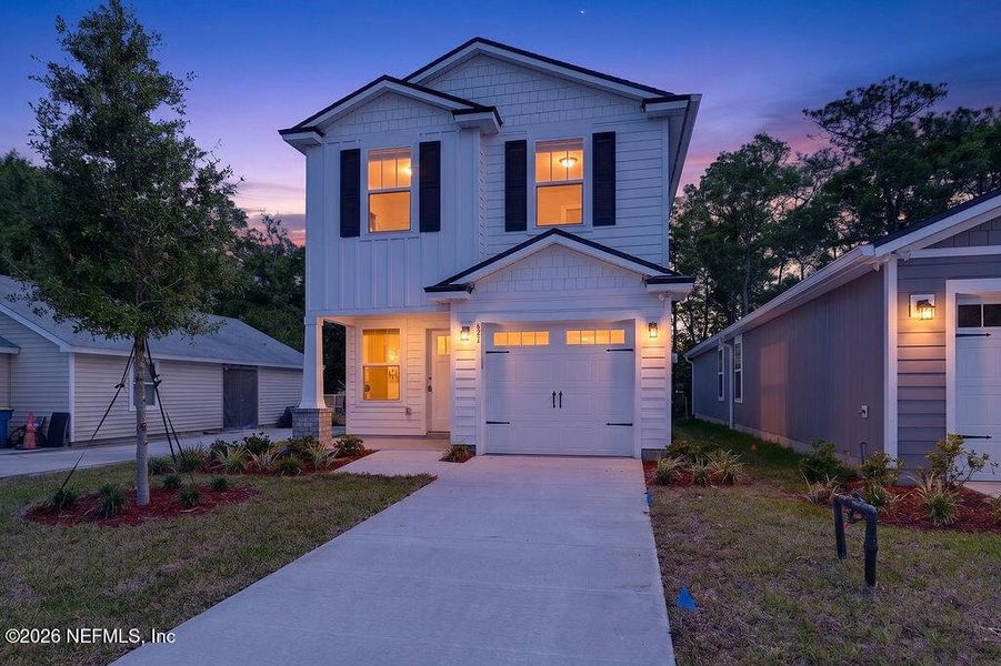 Front exterior of a new home in , Jacksonville, FL, highlighting curb appeal (Image 27).
