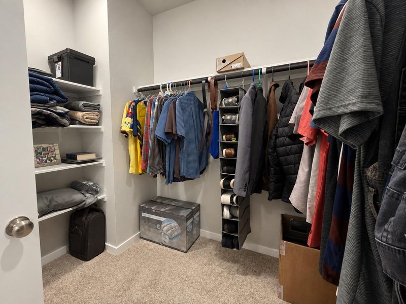 Primary Walk-in Closet Primary Walk-in Closet