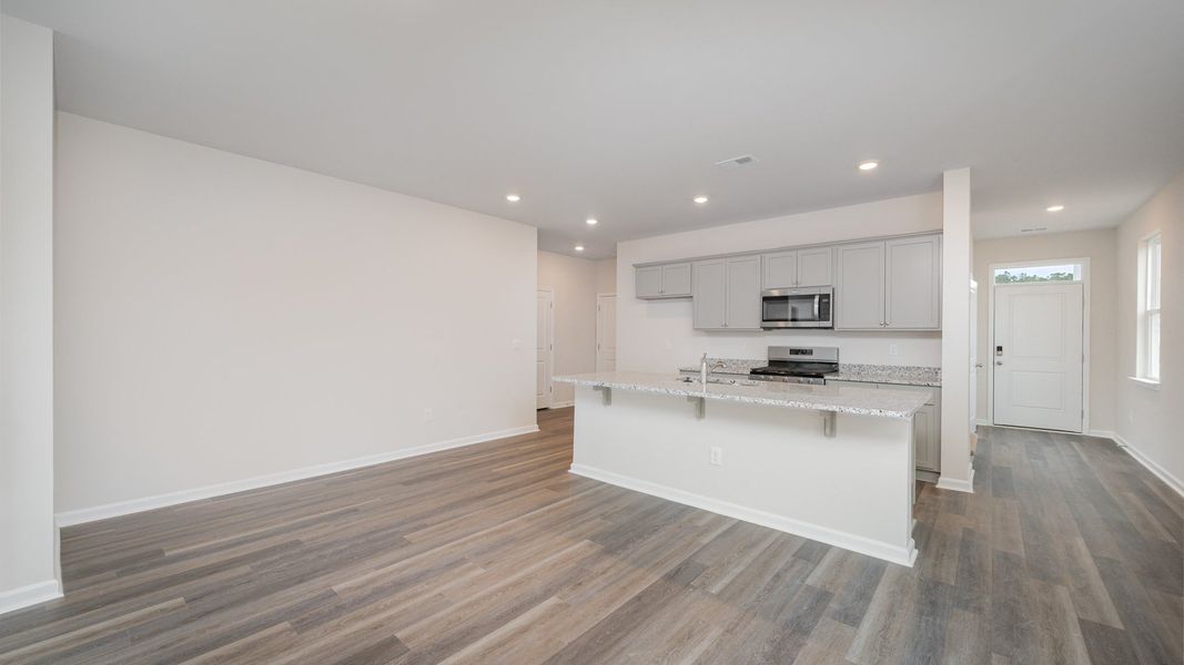 Spacious, unfurnished interior of a new home in Indigo Preserve, Leland (Image 13).