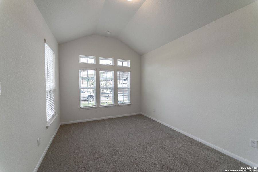 Spacious, unfurnished interior of a new home in The Woodlands at Medina Hills, Mico (Image 13).