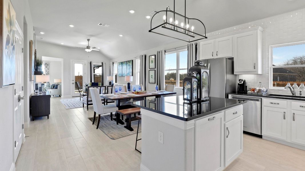 Representative furnished interior of a home built from the Laurel by Brightland Homes in Sunterra, Katy (Image 4).