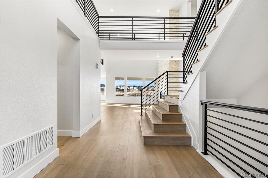 Spacious, unfurnished interior of a new home in Luxe at The Canyons, Castle Pines (Image 40).