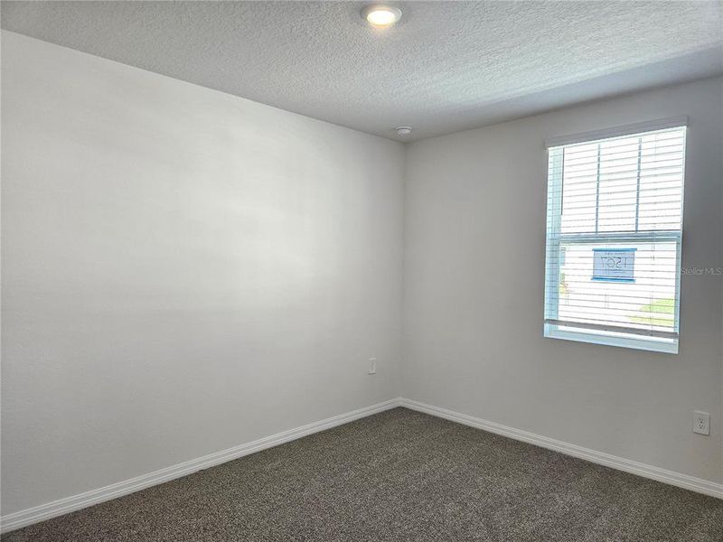 Spacious, unfurnished interior of a new home in Lawson Dunes - Signature Series, Haines City (Image 29).