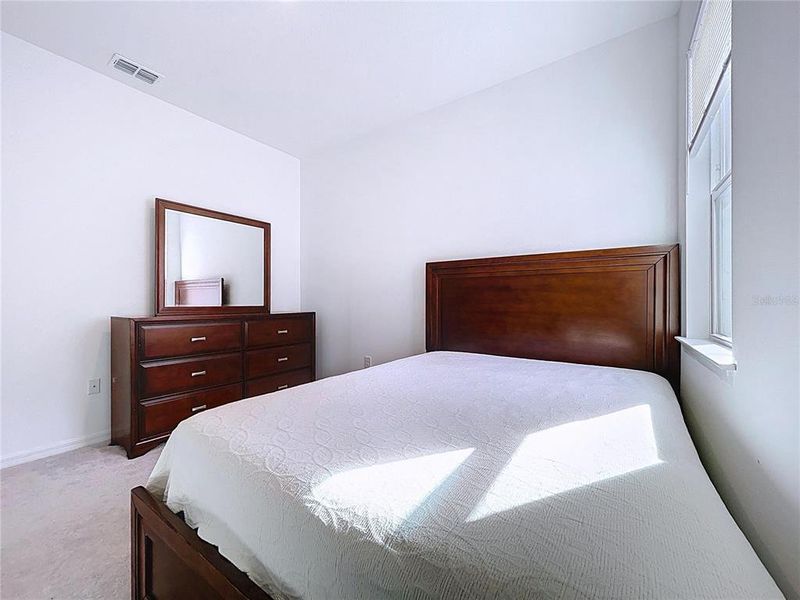 Furnished interior view inside a new home in Covered Bridge at Liberty Bluff, Haines City (Image 45).