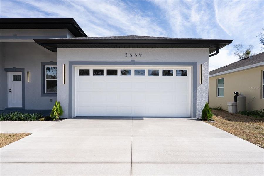 Front exterior of a new home in , Apopka, FL, highlighting curb appeal (Image 19).