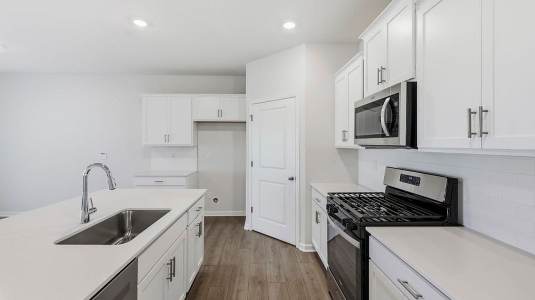 Furnished interior view inside a new home in Benjamin's Grove, Woodruff (Image 6).