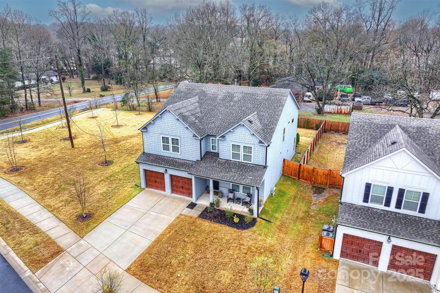 Front exterior of a new home in , Charlotte, NC, highlighting curb appeal (Image 23).