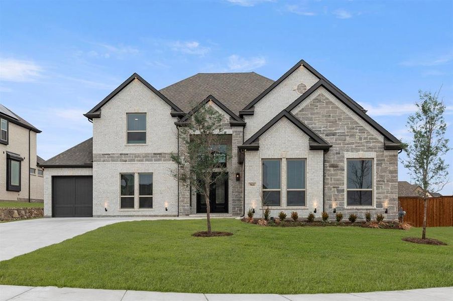Front exterior of a new home in Cambridge Estates - Harwood, Prosper, TX, highlighting curb appeal (Image 2).