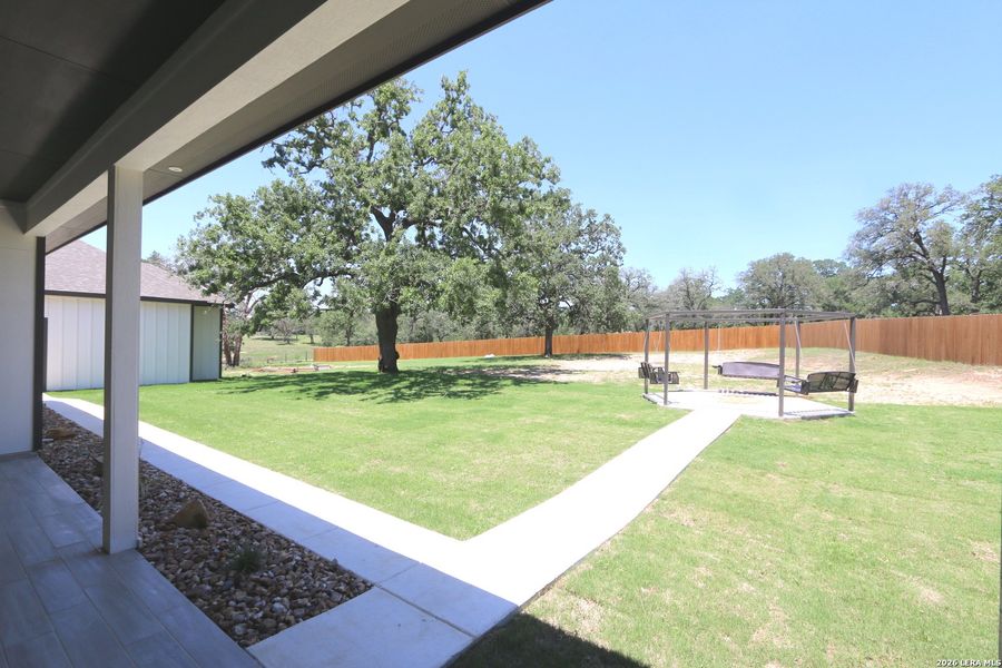 Exterior details and patio area of a home in , La Vernia (Image 47).