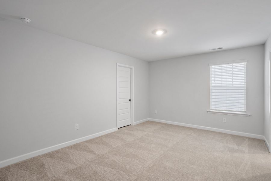 Spacious, unfurnished interior of a new home in Sweetbrier, Durham (Image 38).