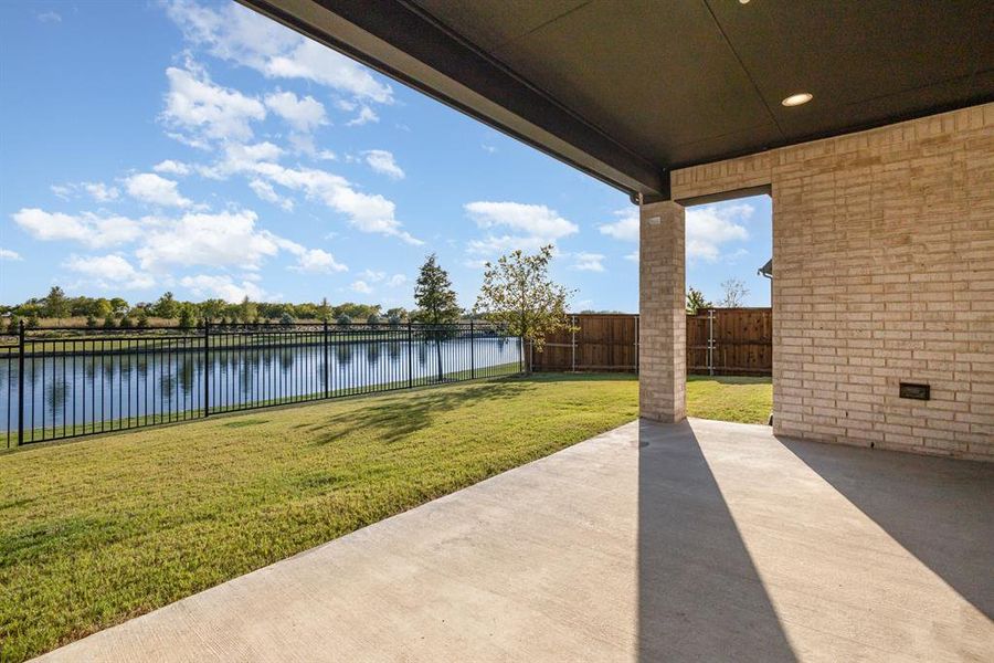 Exterior details and patio area of a home in Cambridge Crossing 50', Celina (Image 14).