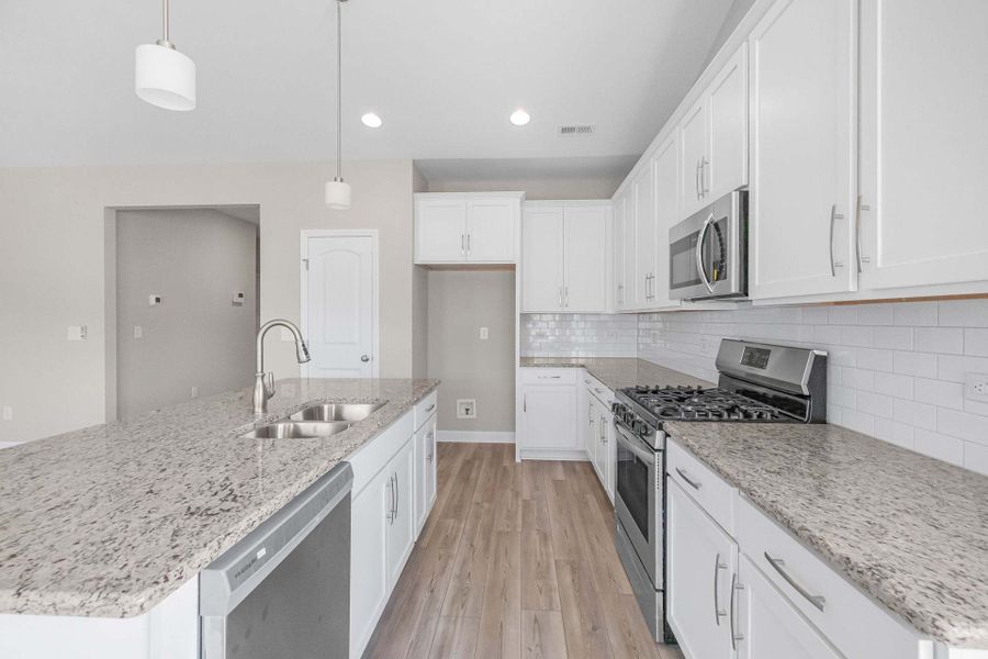 Representative furnished interior of a home built from the Garland by Caviness & Cates Communities in Bartlett Manor, Youngsville (Image 186). Representative furnished interior of a home built from the Garland by Caviness & Cates Communities in Bartlett Manor, Youngsville (Image 186).