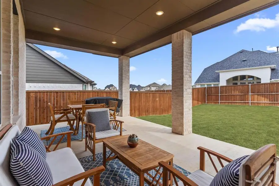 The expanded covered patio offers a backyard retreat with afternoon shade in the Texas heat! Perfect for grilling, gathering & easy outdoor entertaining. The expanded covered patio offers a backyard retreat with afternoon shade in the Texas heat! Perfect for grilling, gathering & easy outdoor entertaining.