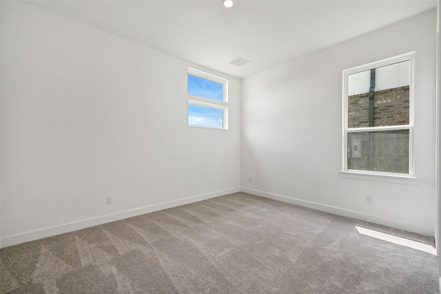 Spacious, unfurnished interior of a new home in Avalon at Friendswood, Friendswood (Image 22).