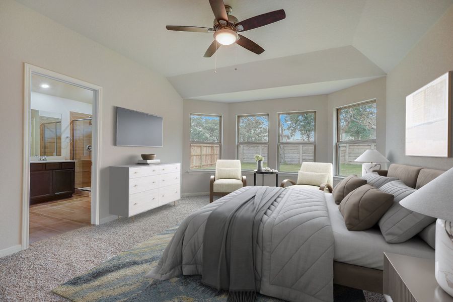 Primary suite bedroom in the Oleander floorplan at a Meritage Homes community.