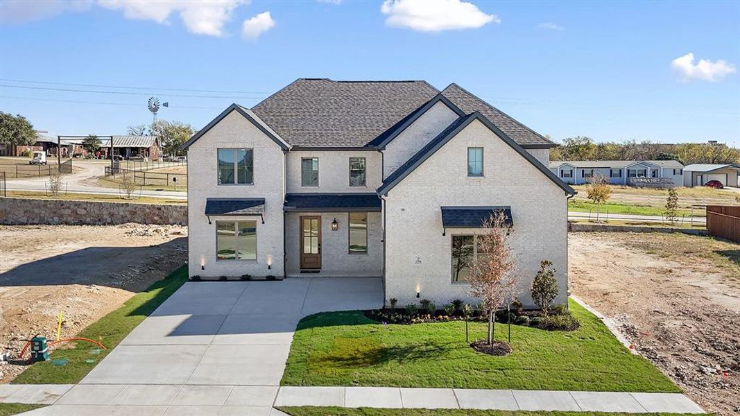 View of front of house with brick siding, a shingled roof, and a residential view View of front of house with brick siding, a shingled roof, and a residential view