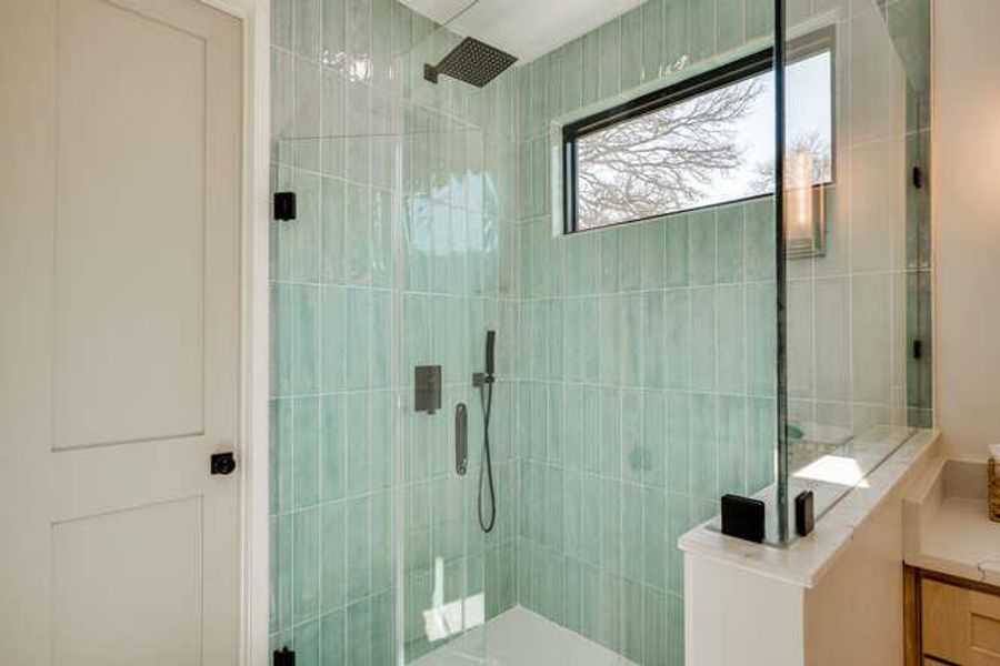 Bathroom with a walk in shower and vanity