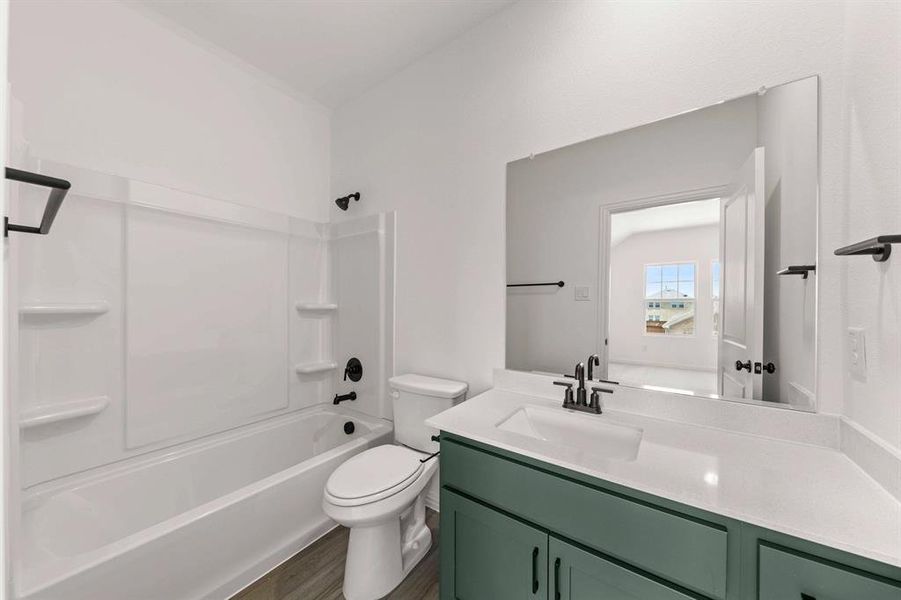 Furnished interior view inside a new home in Creekview Fossil Ridge, Pilot Point (Image 14).