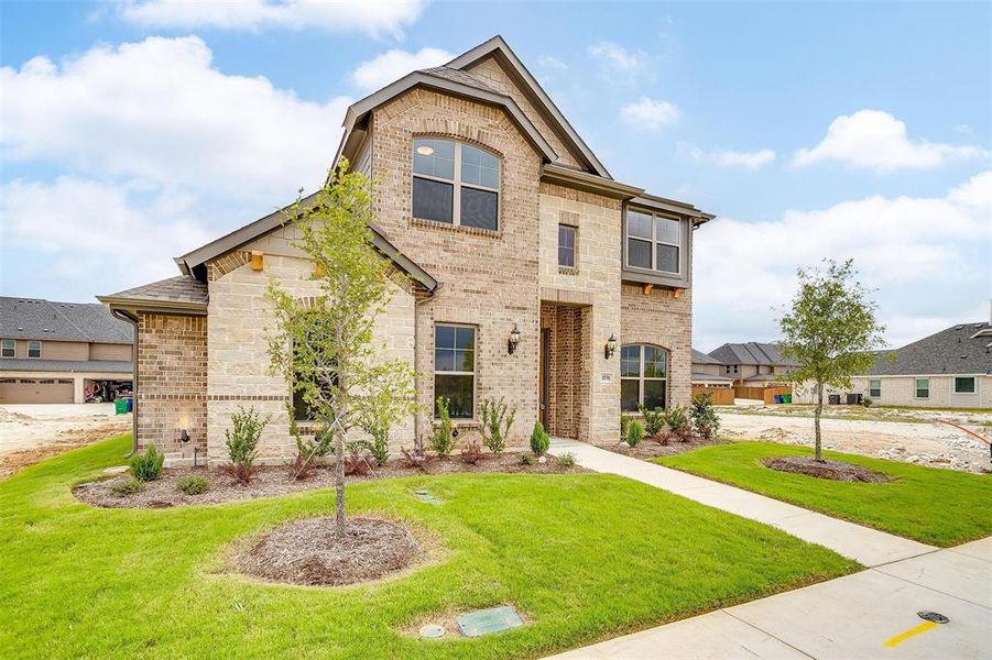 View of front of home with a front lawn