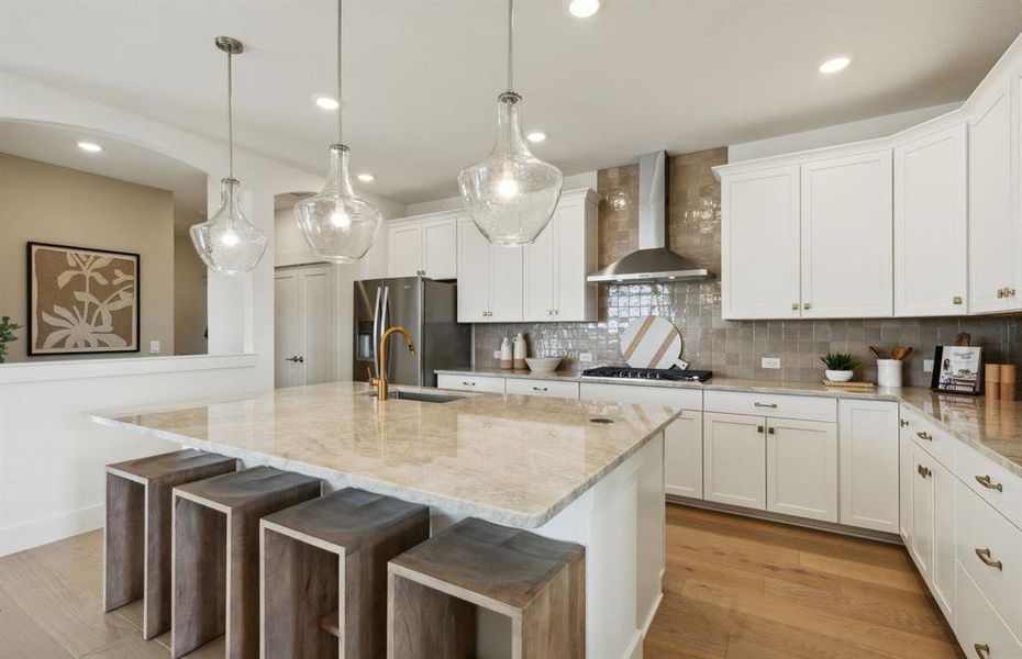 *actual home, furniture not included - Spacious kitchen with eat-in bartop island