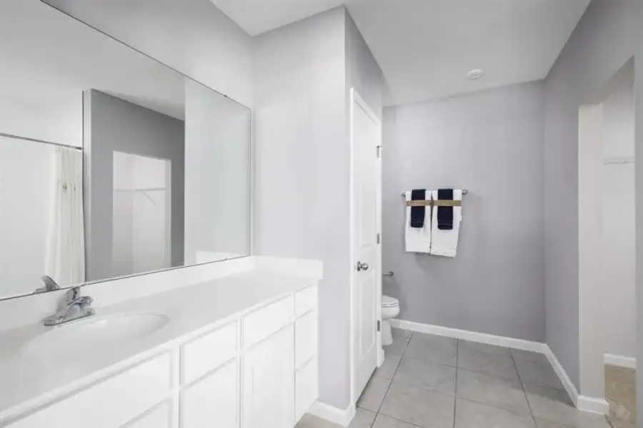 Furnished interior view inside a new home in Central Parc, North Port (Image 12).