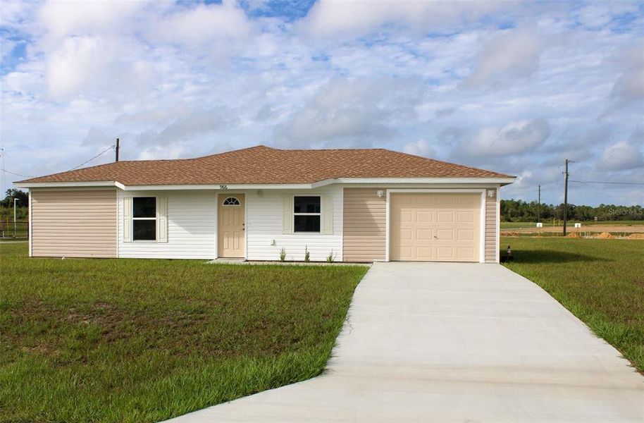 Front exterior of a new home in , Dunnellon, FL, highlighting curb appeal (Image 1). Front exterior of a new home in , Dunnellon, FL, highlighting curb appeal (Image 1).