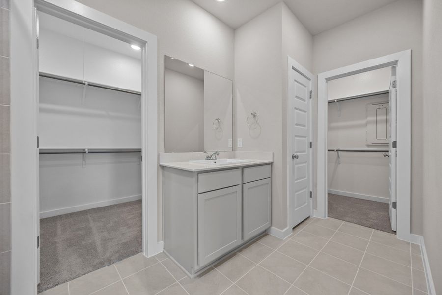Primary Bath in the Brazos home plan by Trophy Signature Homes – REPRESENTATIVE PHOTO