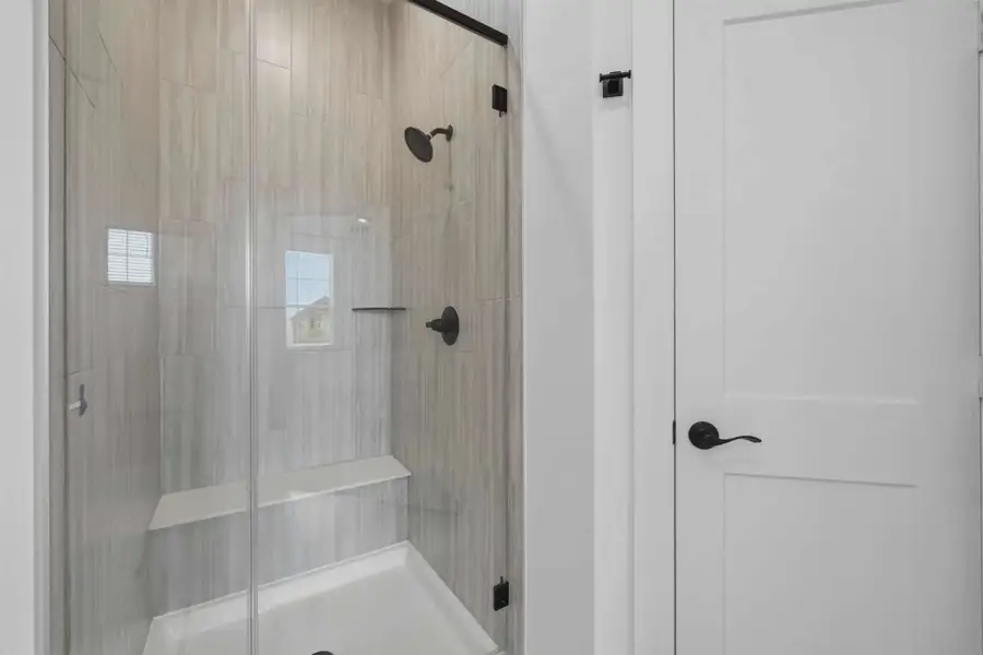 Representative interior finishes for a home built from the Margaux by Chesmar Homes in Bridgeland Chateau, Cypress (Image 20).