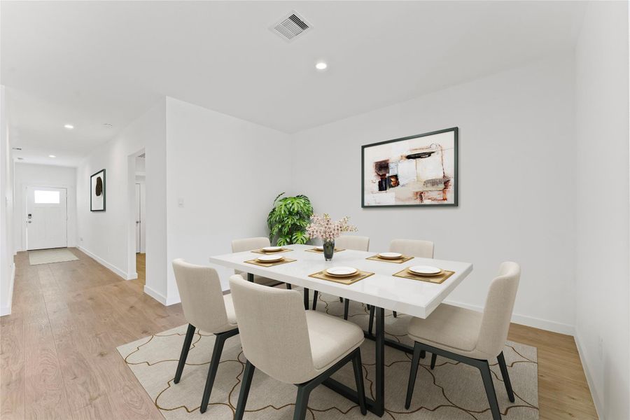 Perfectly positioned directly in front of the kitchen, this dining area makes serving home-cooked meals effortless and convenient. The open layout ensures you are never far from the action, keeping the chef and guests connected during every gathering.