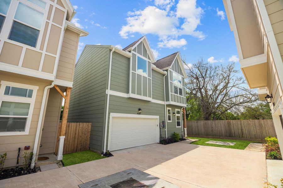 Front exterior of a new home in Montridge, Houston, TX, highlighting curb appeal (Image 25).