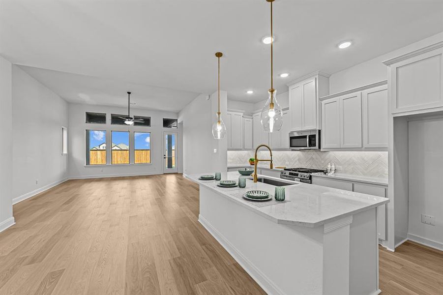 Furnished interior view inside a new home in Creekshaw – Classic, Royse City (Image 9). Furnished interior view inside a new home in Creekshaw – Classic, Royse City (Image 9).