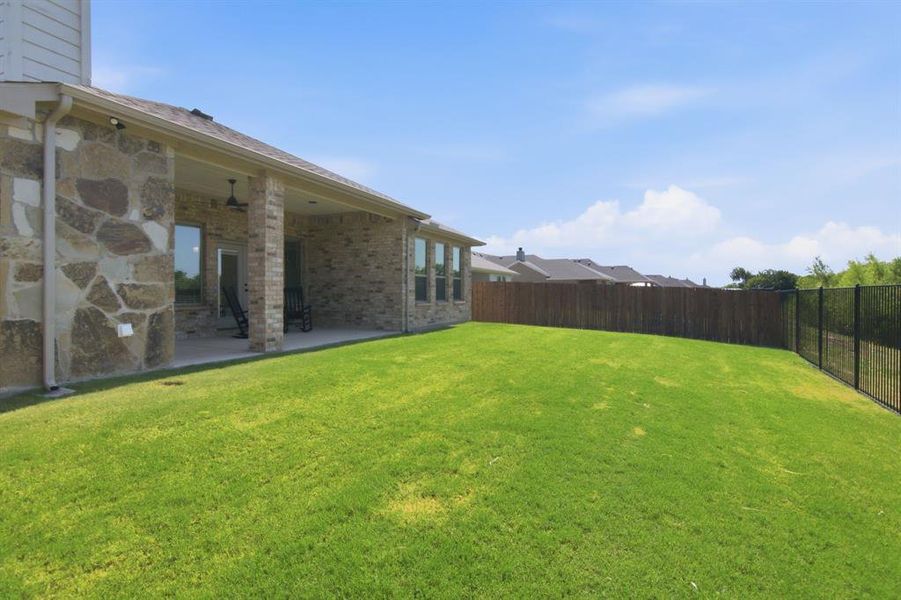 Exterior details and patio area of a home in , Burleson (Image 26).