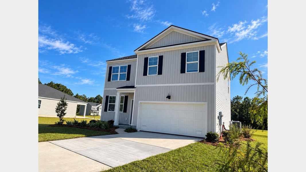 Front exterior of a new home in Cypress Landing, Hardeeville, SC, highlighting curb appeal (Image 2).