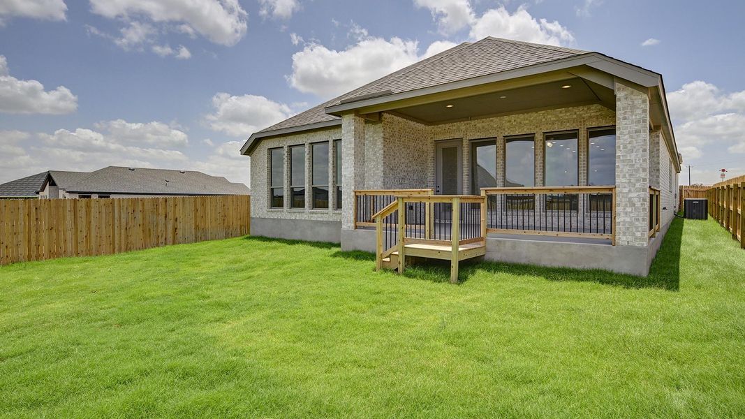 Front exterior of a new home in Alsatian Oaks 50', Castroville, TX, highlighting curb appeal (Image 2). Front exterior of a new home in Alsatian Oaks 50', Castroville, TX, highlighting curb appeal (Image 2).