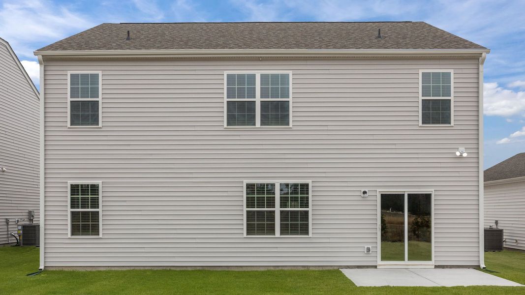 Exterior details and patio area of a home in Ridgewood Farms, Winterville (Image 23). Exterior details and patio area of a home in Ridgewood Farms, Winterville (Image 23).