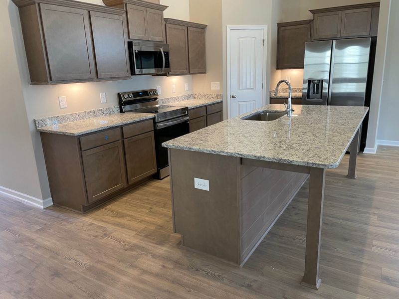 Furnished interior view inside a new home in Brandon Woods, Spring Hill (Image 7). Furnished interior view inside a new home in Brandon Woods, Spring Hill (Image 7).