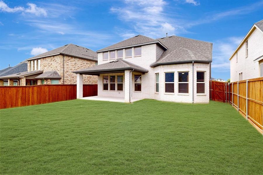 Front exterior of a new home in Aster Park, McKinney, TX, highlighting curb appeal (Image 2). Front exterior of a new home in Aster Park, McKinney, TX, highlighting curb appeal (Image 2).