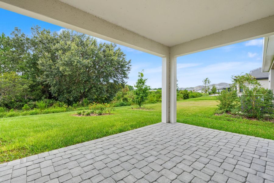 Exterior details and patio area of a home in Tamarack at Two Rivers, Zephyrhills (Image 3).