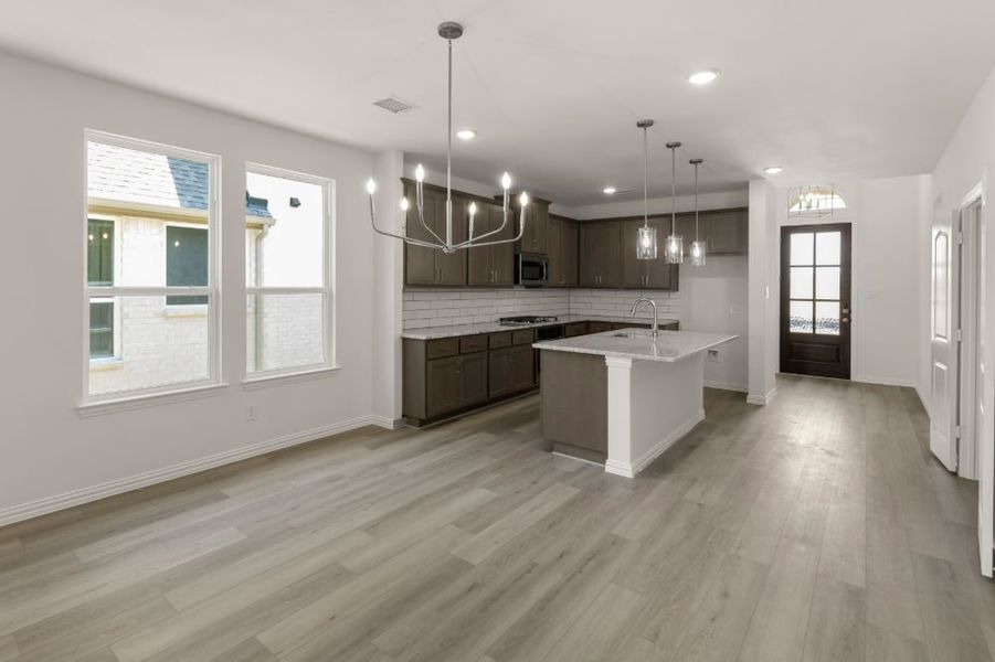 Representative furnished interior of a home built from the Cypress by UnionMain Homes in Edgewater, Fate (Image 11).