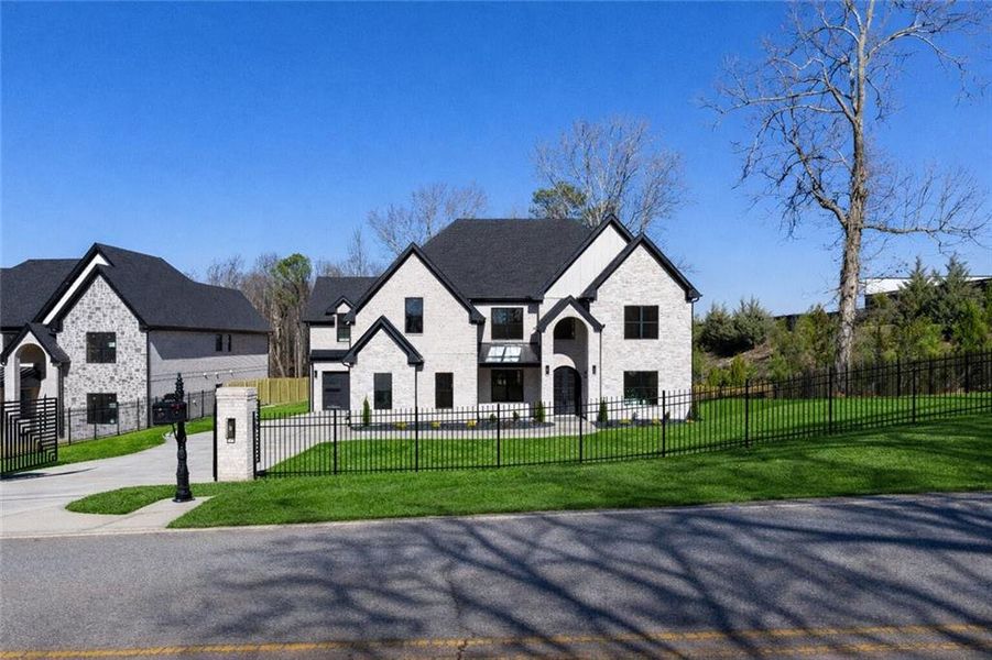 Front exterior of a new home in , Suwanee, GA, highlighting curb appeal (Image 32).